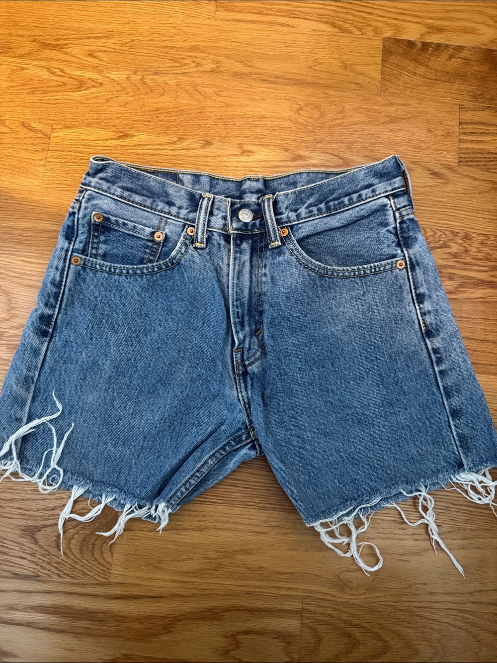 Levi’s • High-Waist Distressed Denim Cutoff Shorts - Blue
